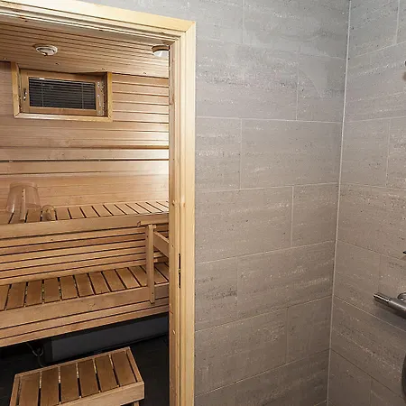 Апартаменты Cozy Alpine-Style Apartment In The Heart Of Levi With Private Sauna & Fireplace